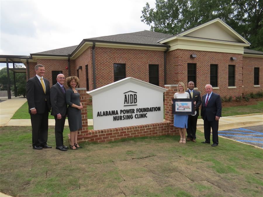 Alabama Power Foundation standing in front of the new AIDB Nursing Clinic